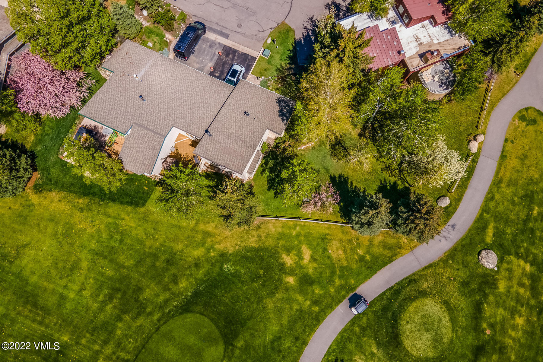 8 Deer Boulevard Eagle-Vail, CO 81620 - Photo 30 of 34 an aerial view of residential houses with outdoor space and trees