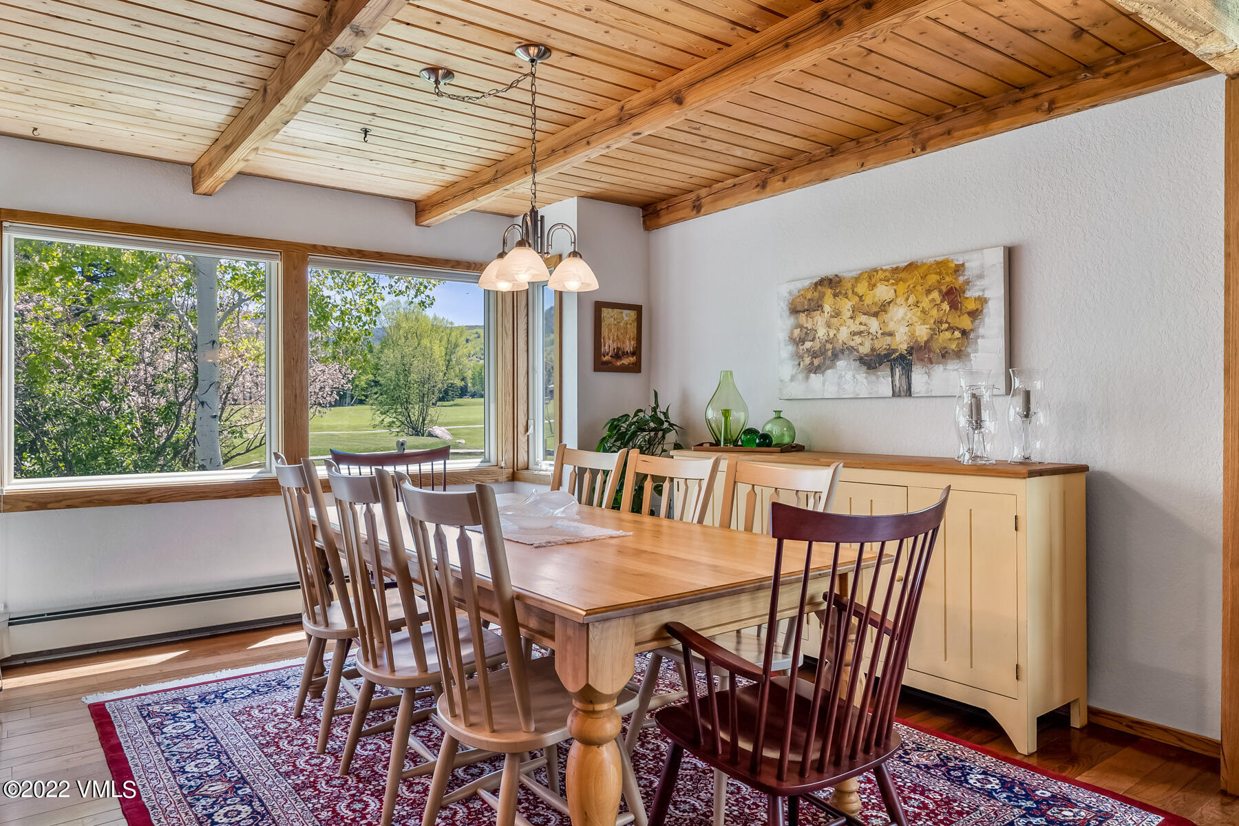 8 Deer Boulevard Eagle-Vail, CO 81620 - Photo 3 of 34 a view of a dining room with furniture wooden floor and a chandelier