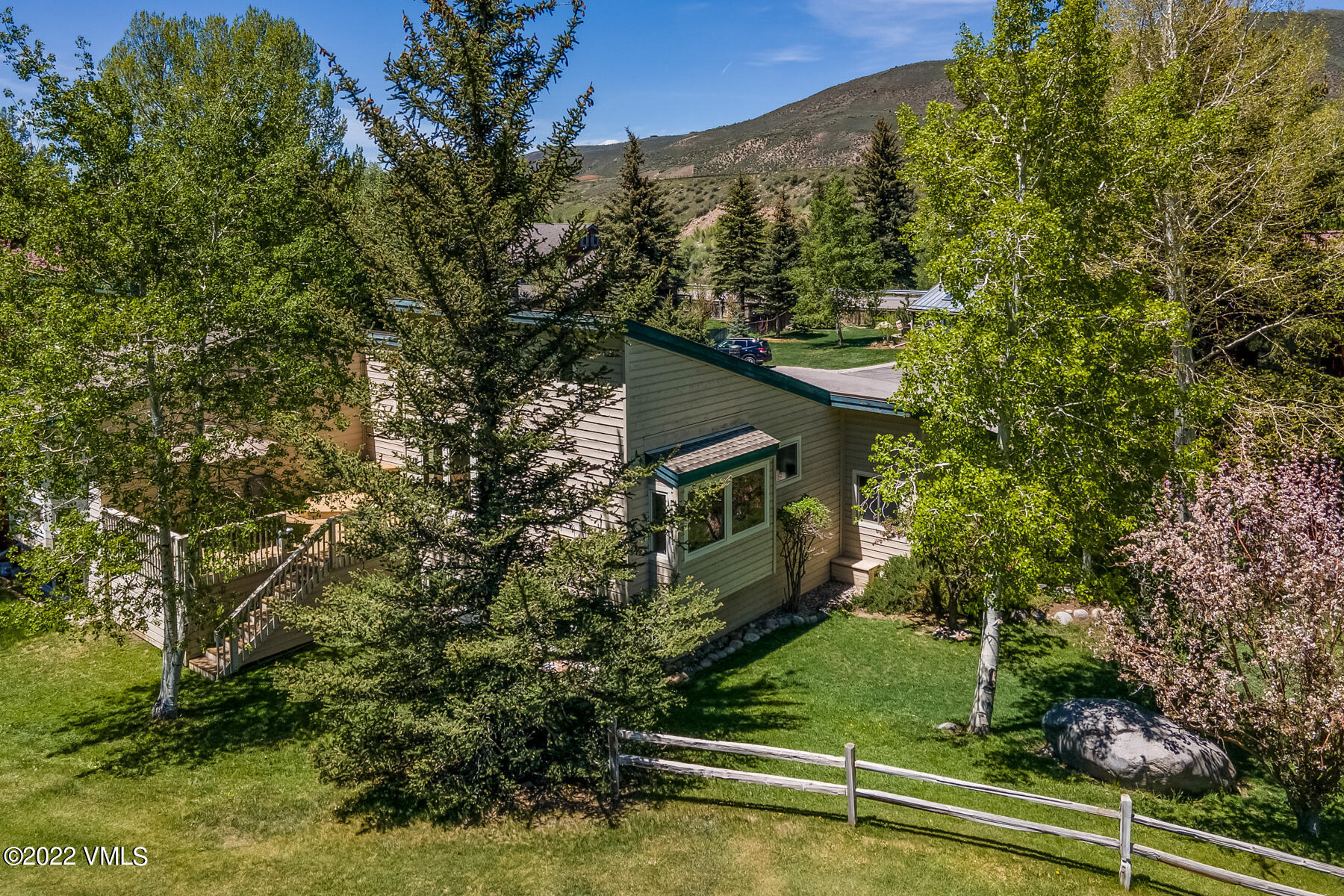 8 Deer Boulevard Eagle-Vail, CO 81620 - Photo 33 of 34 a view of house with backyard