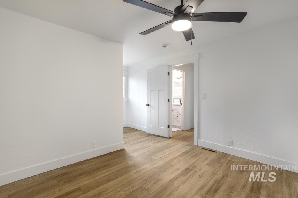 344 Fillmore Street Twin Falls, ID 83301 - Photo 20 of 42 Spare room featuring light wood-type flooring and ceiling fan