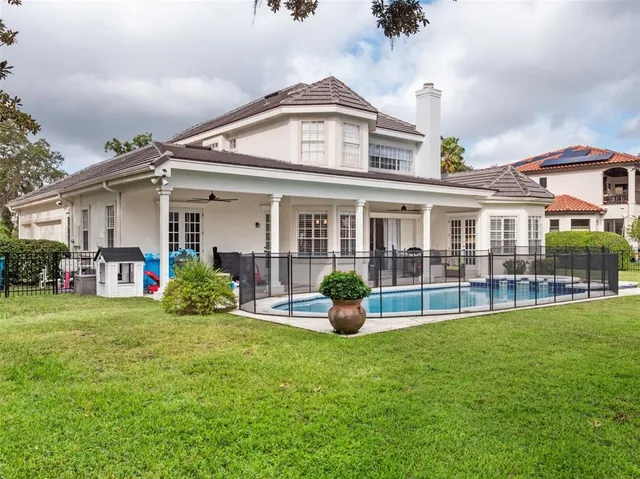 a front view of a house with a yard and porch
