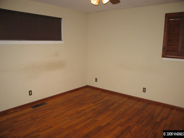1901 West 6th Street Reno, NV 89503 - Photo 4 of 9 an empty room with wooden floor