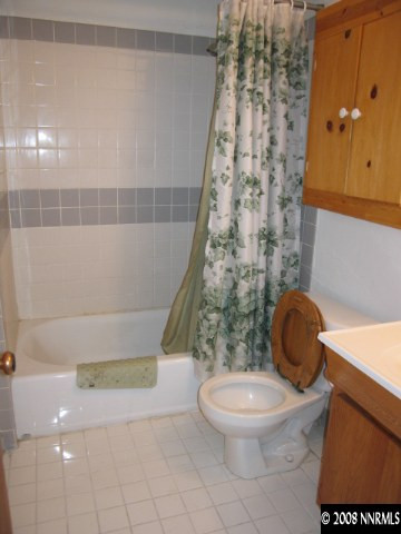 1901 West 6th Street Reno, NV 89503 - Photo 6 of 9 a bathroom with a toilet and a shower