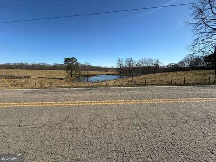 a view of an lake and a yard