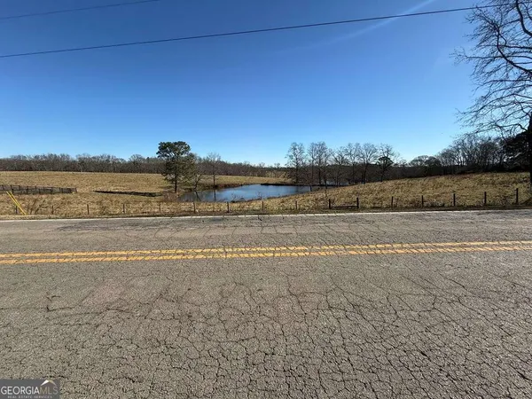 a view of an lake and a yard
