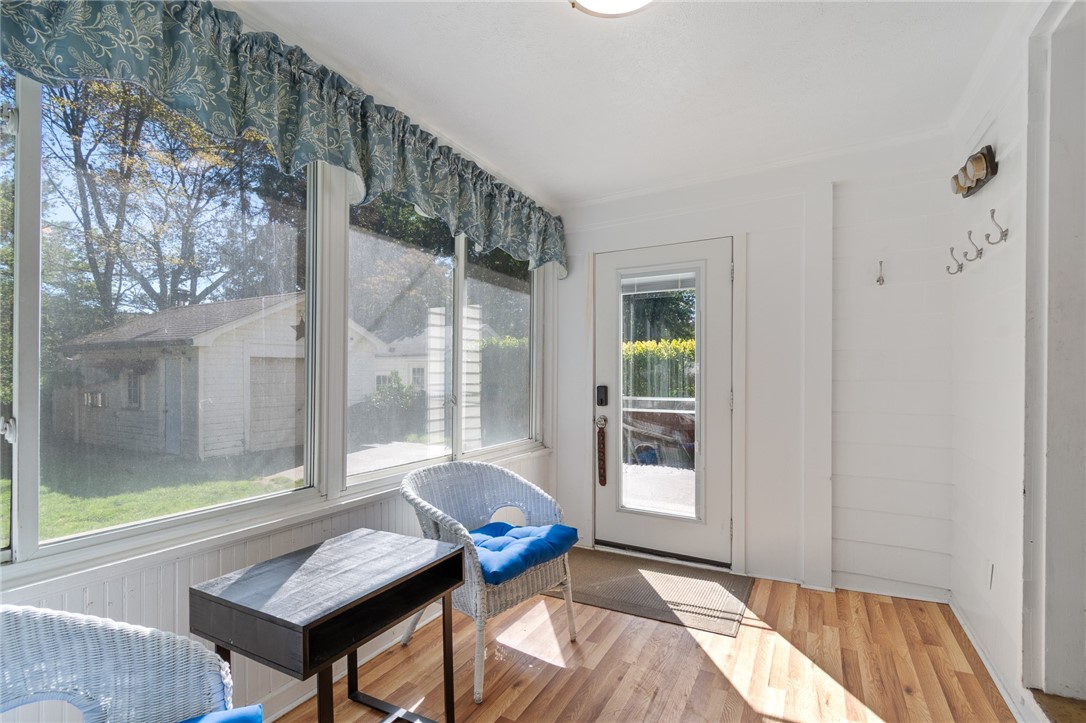 235 Wildmere Road Irondequoit, NY 14617 - Photo 21 of 41 The rear ENCLOSED PATIO ROOM! Enjoy ALL THE SEASONS in this space! Even has its own heat source!