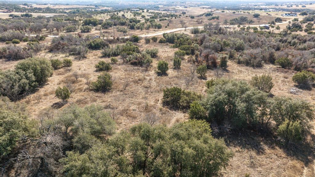 Tbd Tbd Buffalo Ridge Drive Stephenville, TX 76401 - Photo 21 of 29 an aerial view of residential houses with outdoor space and trees