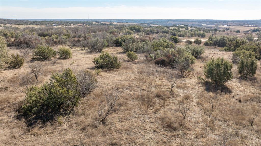 Tbd Tbd Buffalo Ridge Drive Stephenville, TX 76401 - Photo 22 of 29 an aerial view of house with yard and mountain view in back