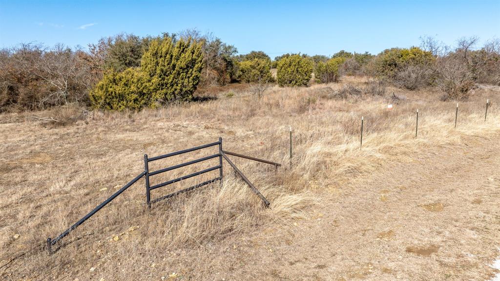Tbd Tbd Buffalo Ridge Drive Stephenville, TX 76401 - Photo 25 of 29 a view of a yard with wooden fence