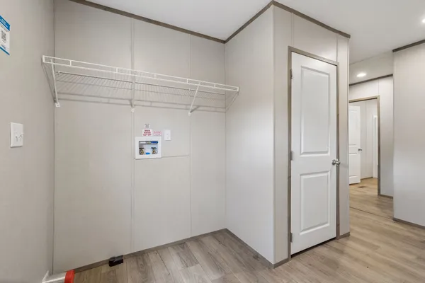 a view of a balcony with wooden floor and yard