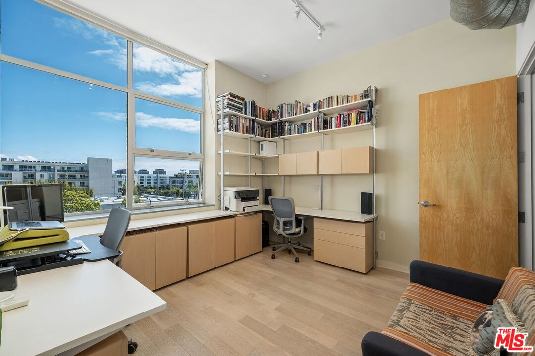 4080 Glencoe Avenue, Unit 420 Marina del Rey, CA 90292 - Photo 14 of 40 a view of a workspace with furniture and a window