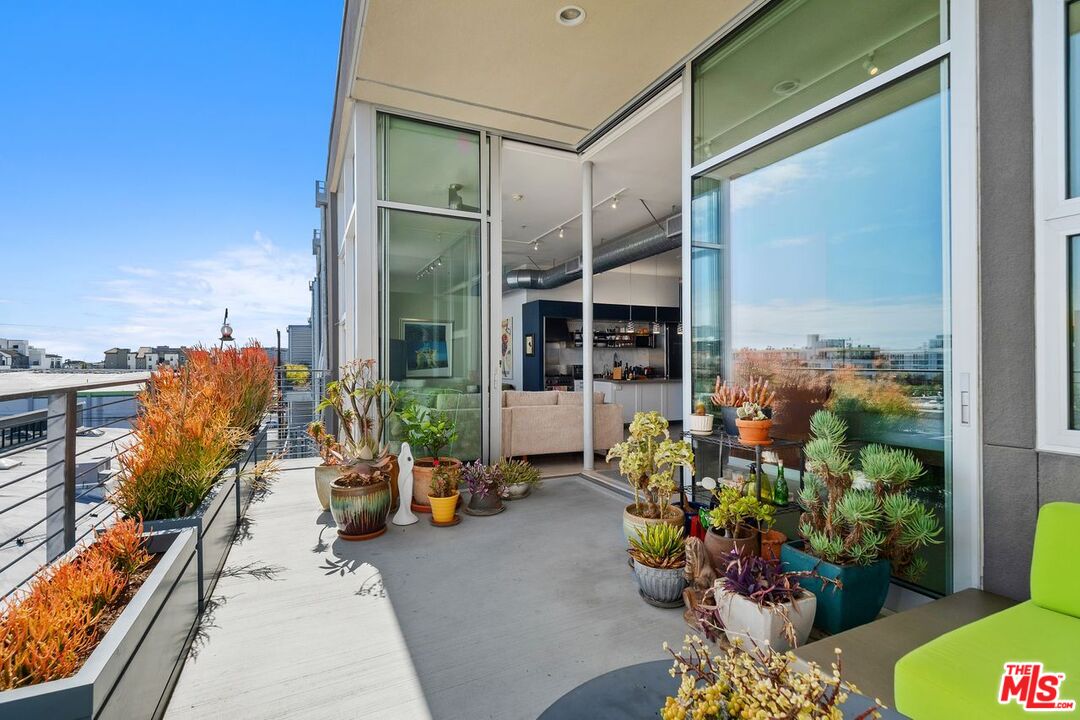 4080 Glencoe Avenue, Unit 420 Marina del Rey, CA 90292 - Photo 28 of 40 a front view of a house with outdoor seating