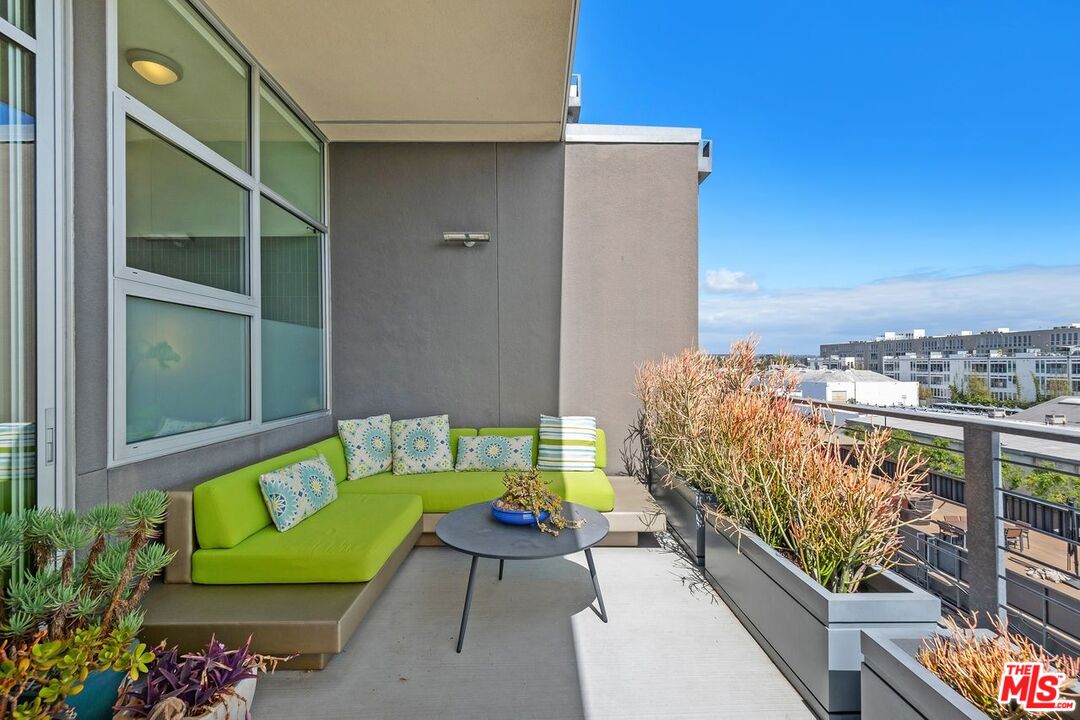 4080 Glencoe Avenue, Unit 420 Marina del Rey, CA 90292 - Photo 29 of 40 a view of a chairs and table in patio