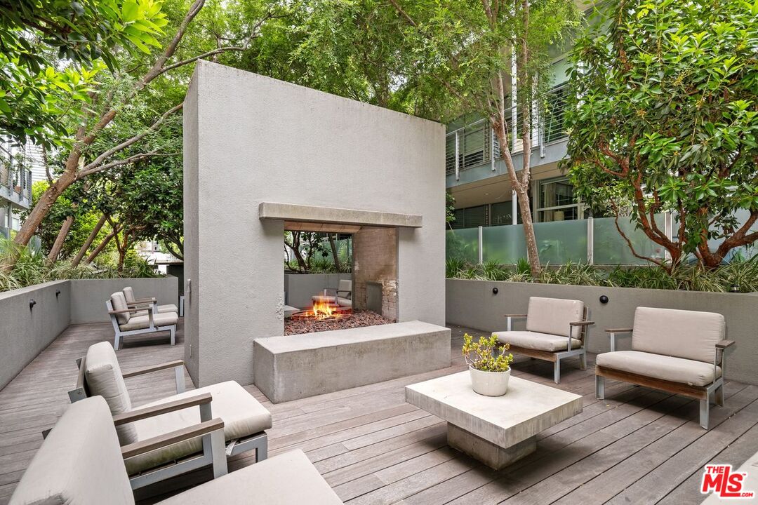 4080 Glencoe Avenue, Unit 420 Marina del Rey, CA 90292 - Photo 39 of 40 a outdoor living space with patio furniture and a potted plant