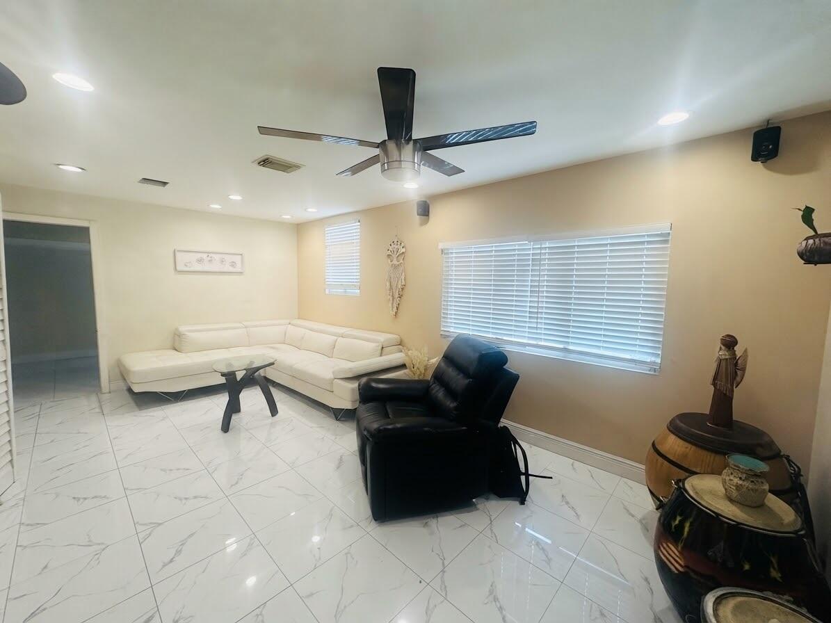 3718 Coconut Road, Unit A Palm Springs, FL 33461 - Photo 4 of 19 Living Room 3