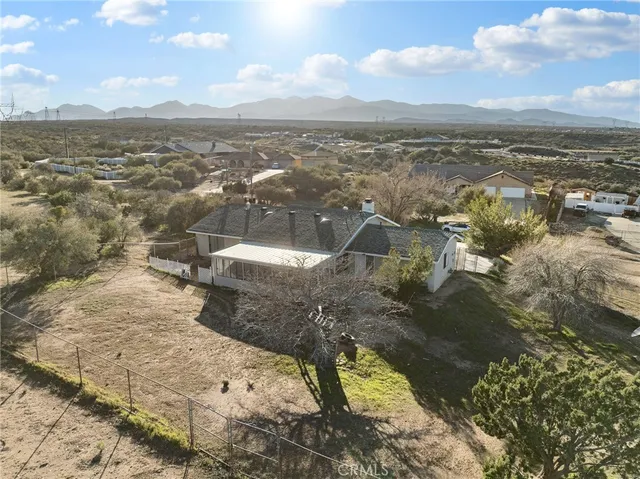 a view of a lake with a yard