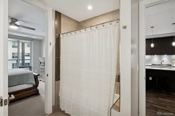 a view of a bathroom from a hallway