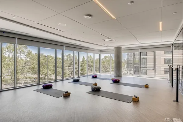 a building with pool table and couch