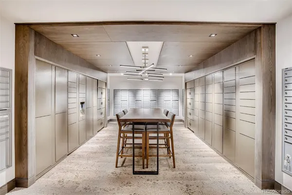 a view of a hallway with seating space