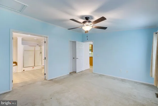 a room with a sink and a mirror