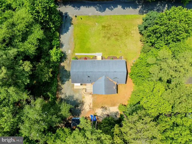 a view of a field with an outdoor space
