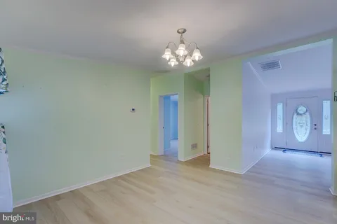 a kitchen with stainless steel appliances granite countertop a granite counter tops and a refrigerator