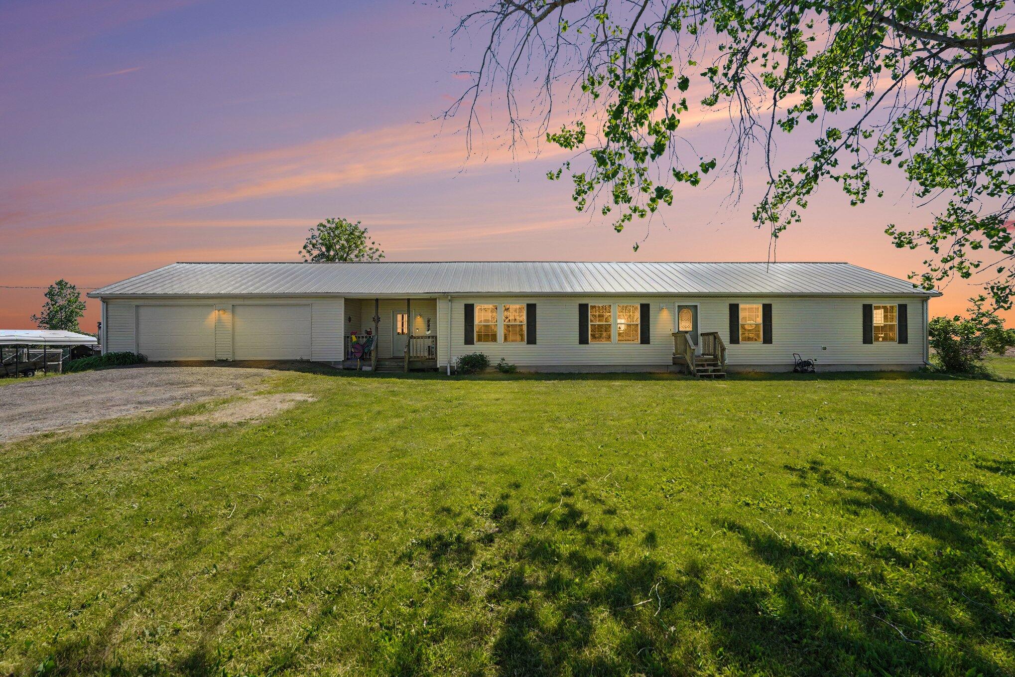 3325 Price Road Ravenna, MI 49451 - Photo 2 of 25 twilight