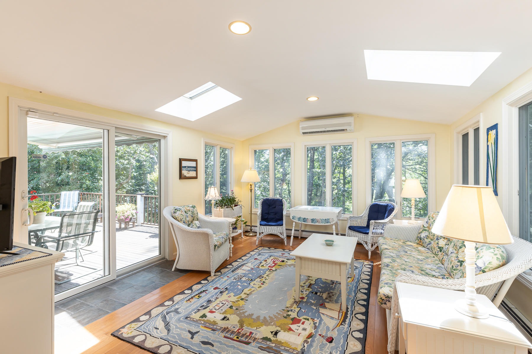 230 Santuit Road Cotuit, MA 02635 - Photo 11 of 46 a living room with furniture and large windows