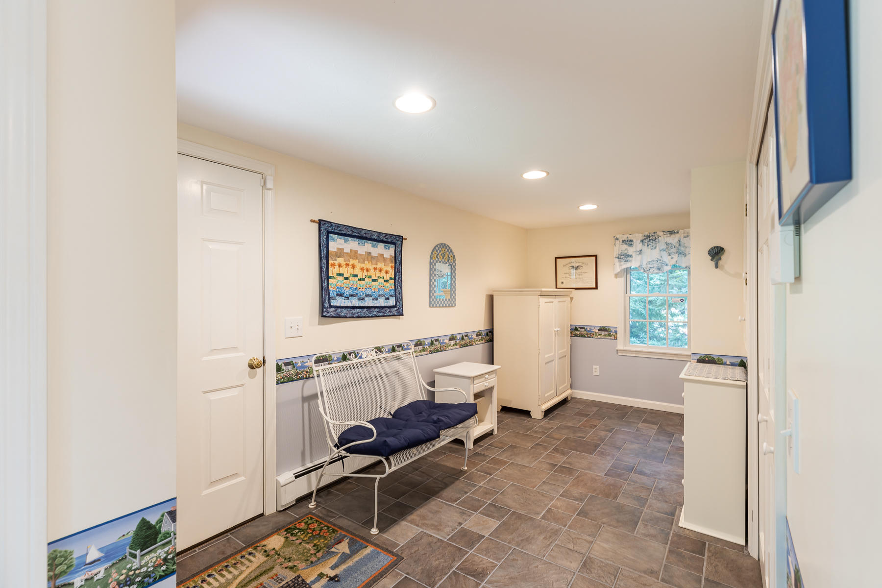 230 Santuit Road Cotuit, MA 02635 - Photo 17 of 46 a room with furniture and a window