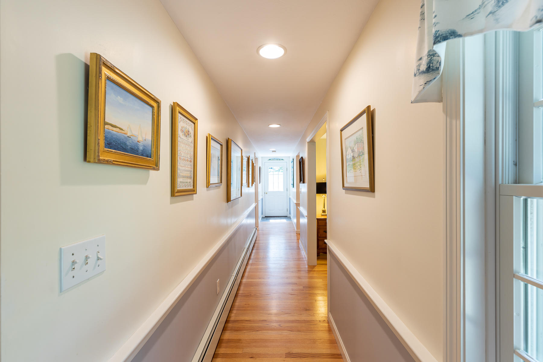 230 Santuit Road Cotuit, MA 02635 - Photo 18 of 46 a view of a hallway with wooden floor and staircase