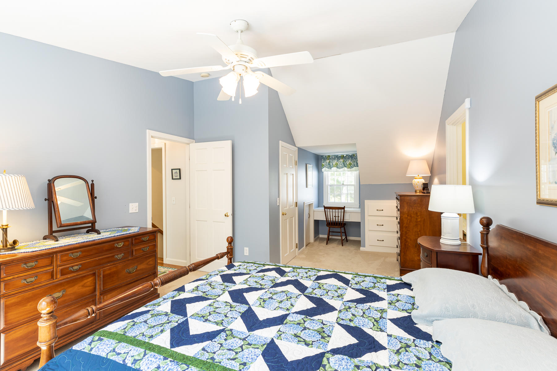 230 Santuit Road Cotuit, MA 02635 - Photo 26 of 46 a bedroom with a bed and wooden floor