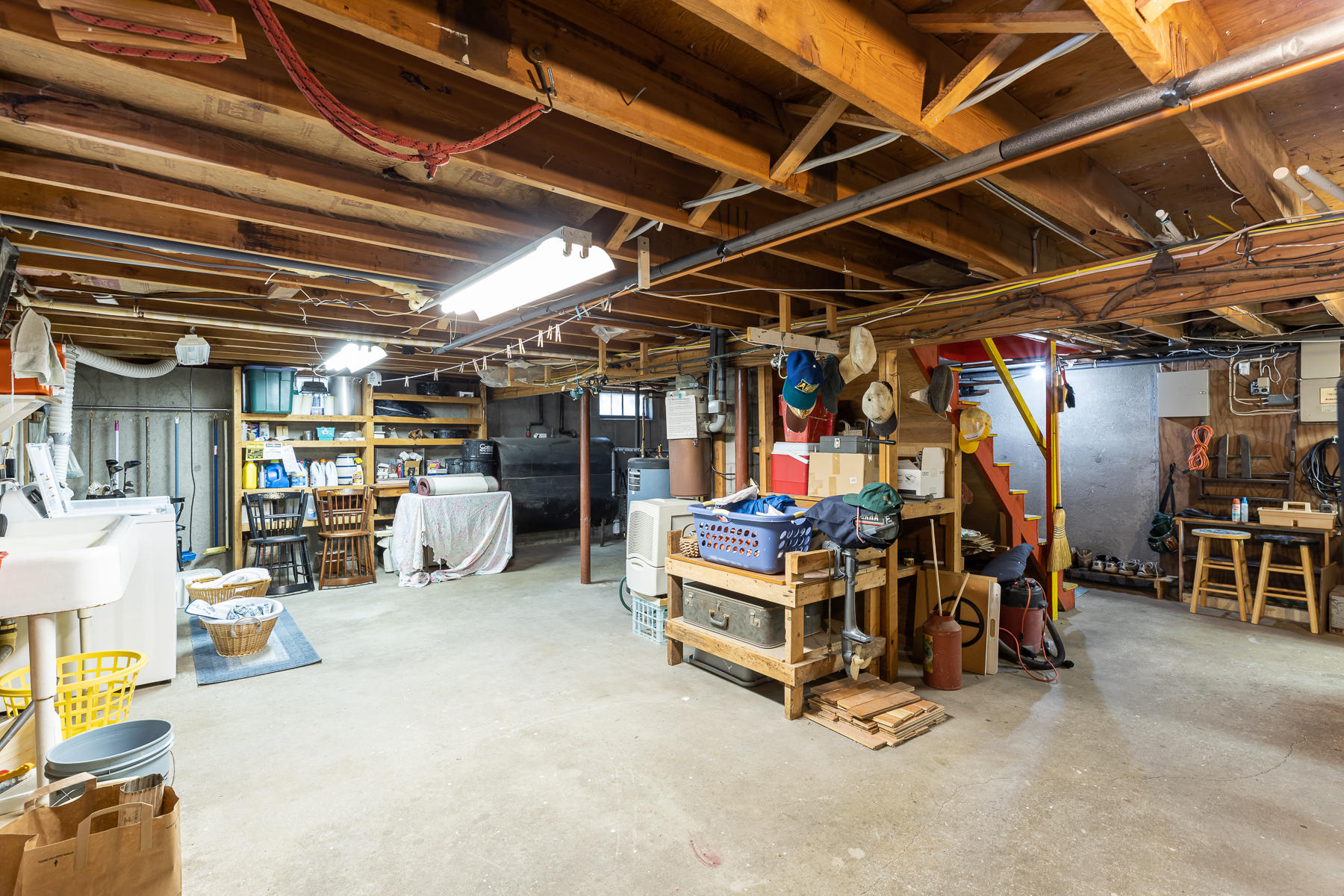230 Santuit Road Cotuit, MA 02635 - Photo 35 of 46 a view of a storage room with racks