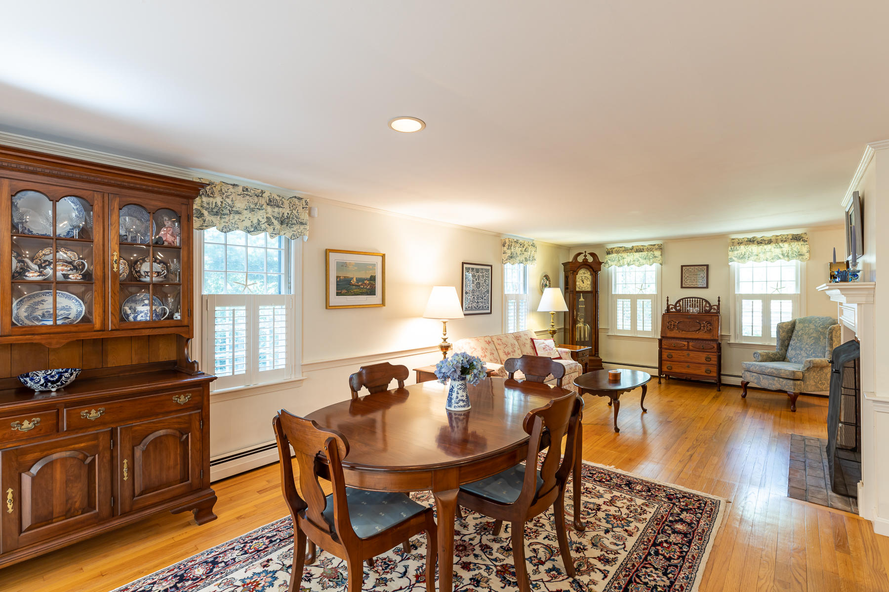 230 Santuit Road Cotuit, MA 02635 - Photo 6 of 46 a view of a dining room with furniture and wooden floor
