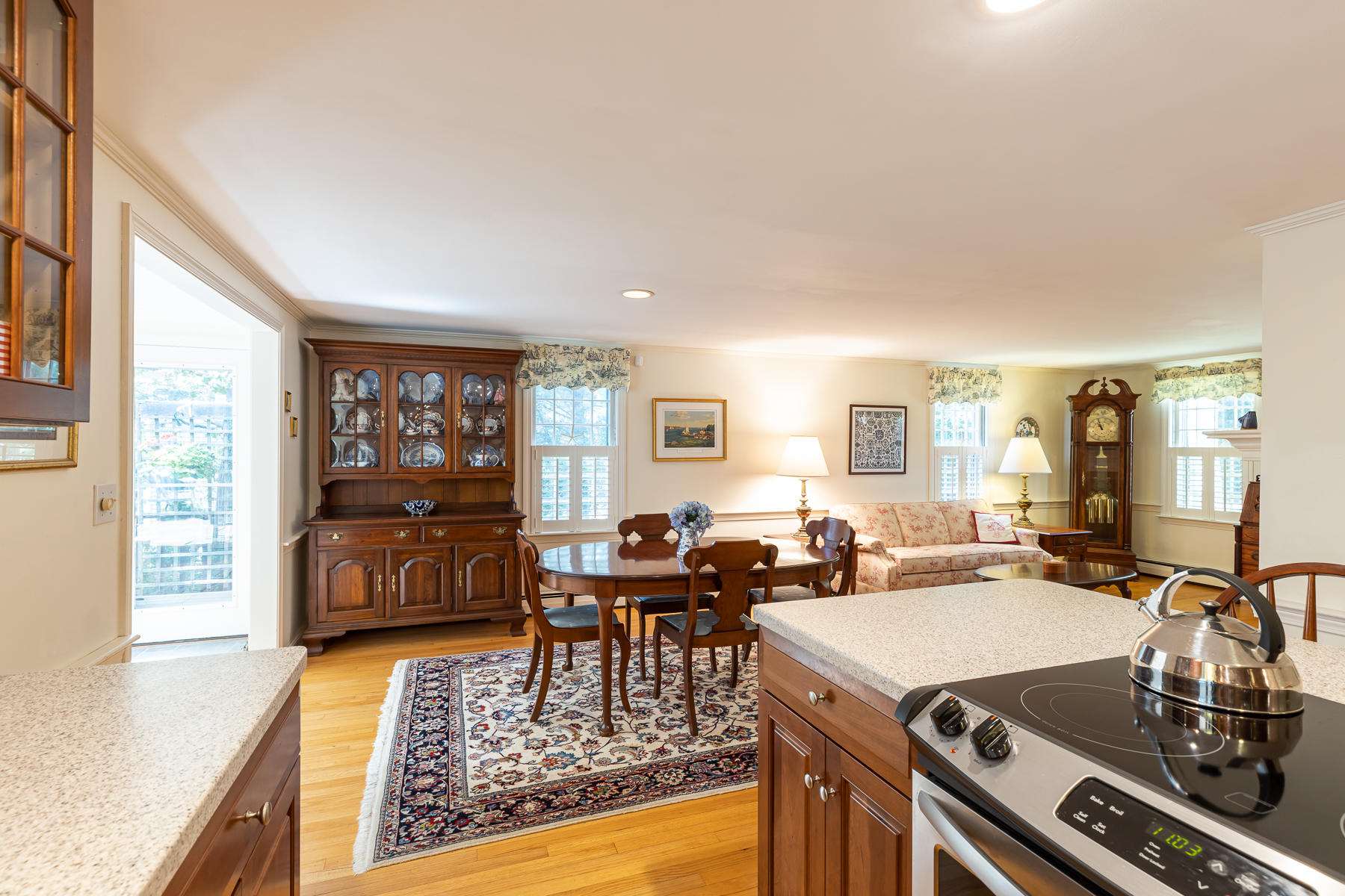 230 Santuit Road Cotuit, MA 02635 - Photo 7 of 46 a view of a dining room with furniture window and wooden floor