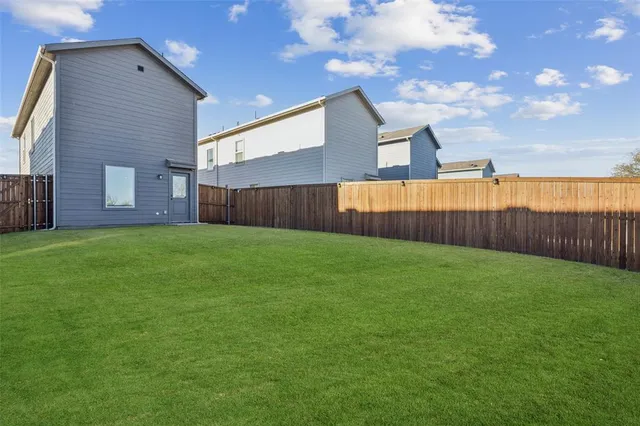 a view of a backyard with a garden