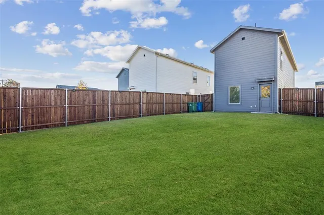 a view of a backyard with a garden