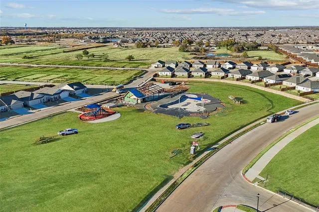 a view of a pool with a couple of people