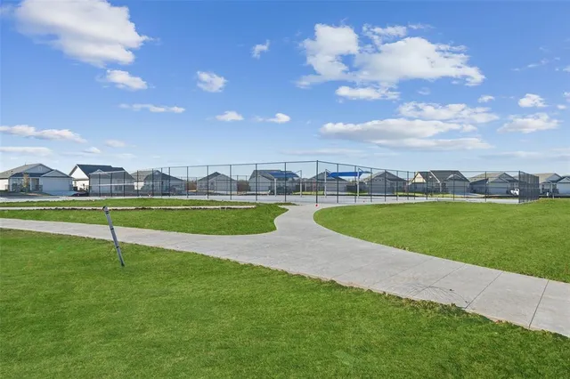 a view of a golf course with a lake