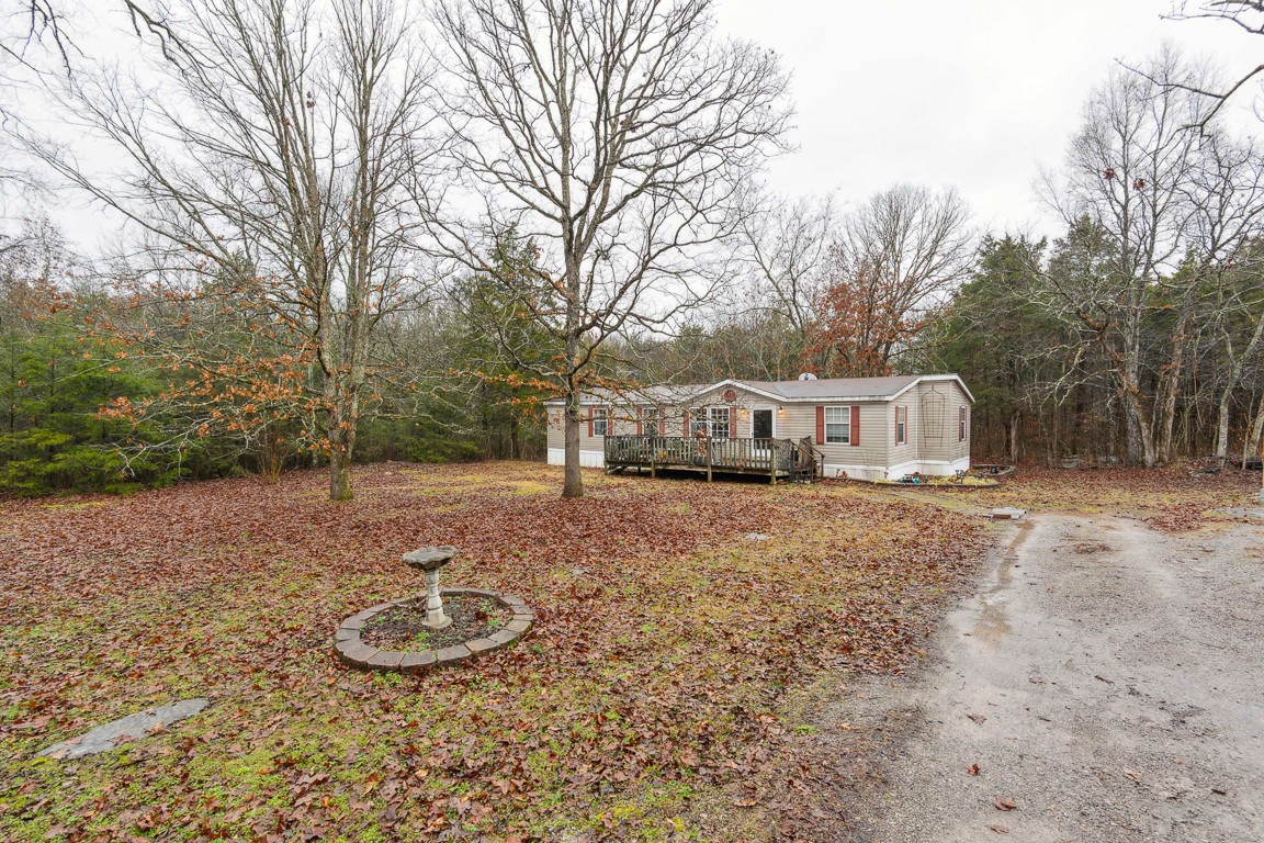 2215 Gwynn Road Lebanon, TN 37090 - Photo 2 of 17 a view of a house with backyard and trees