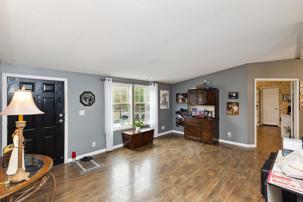 2215 Gwynn Road Lebanon, TN 37090 - Photo 5 of 17 a view of a livingroom with furniture and windows