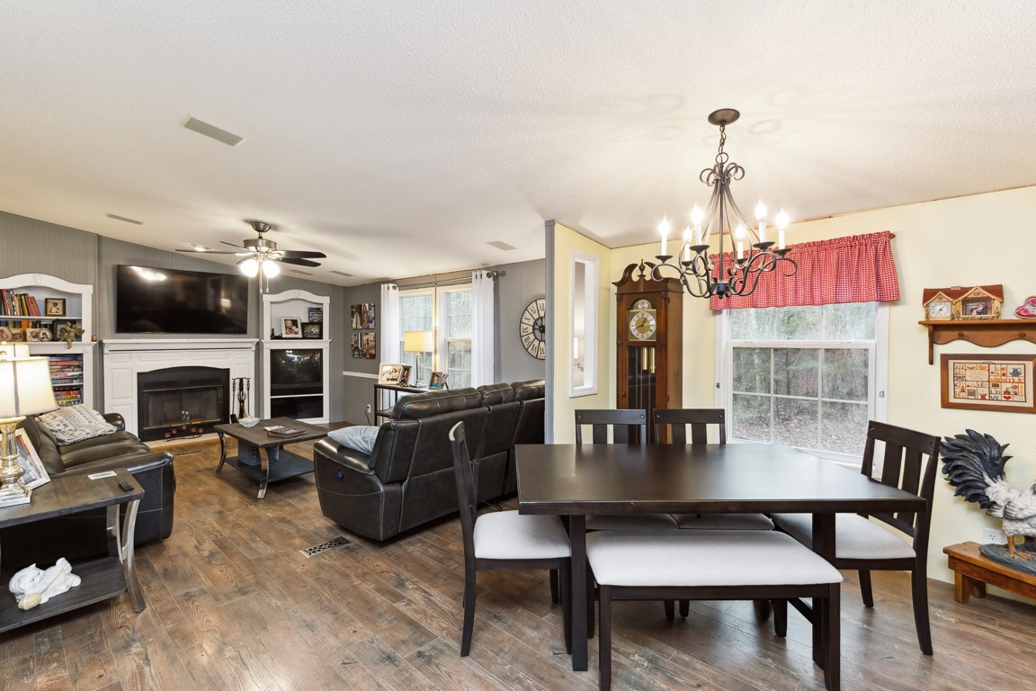 2215 Gwynn Road Lebanon, TN 37090 - Photo 8 of 17 a living room with furniture a fireplace and a flat screen tv