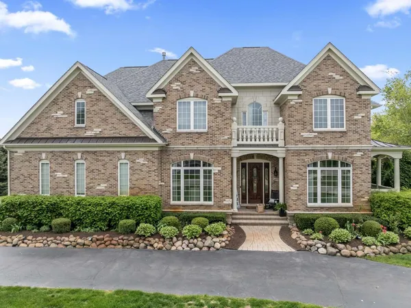an aerial view of a house with garden