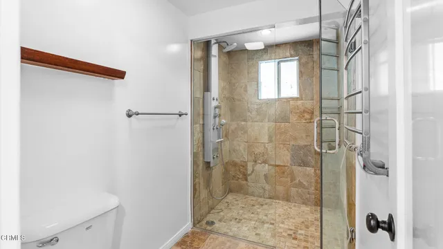 a porch with wooden floor and outdoor space