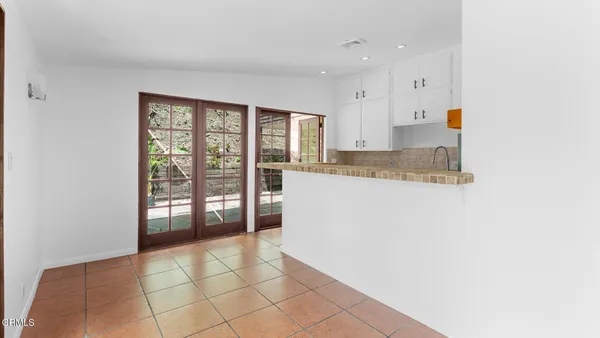 a view of a kitchen with a sink