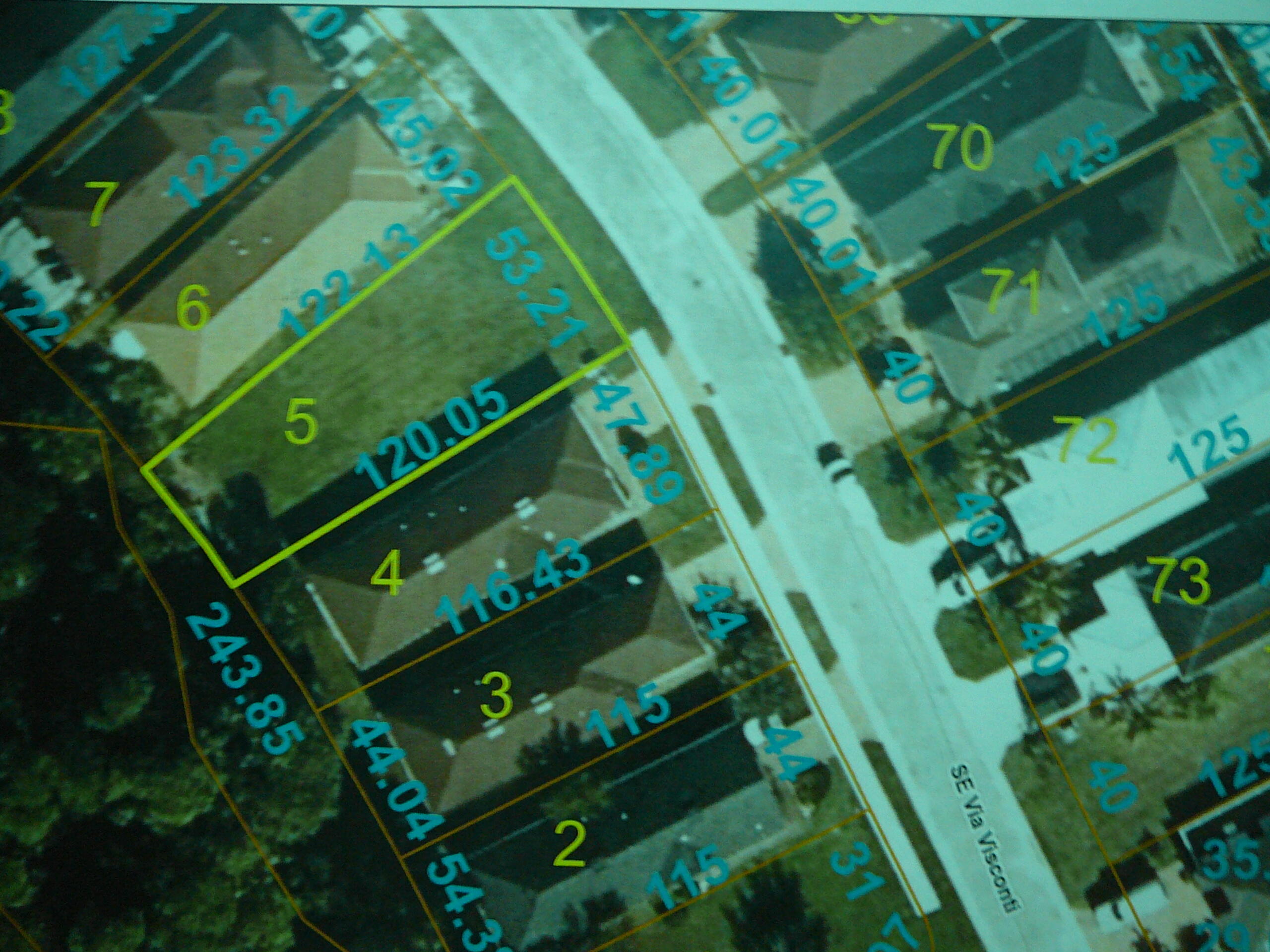 123 Southeast Via Visconti Port St. Lucie, FL 34952 - Photo 2 of 2 a view of a yard