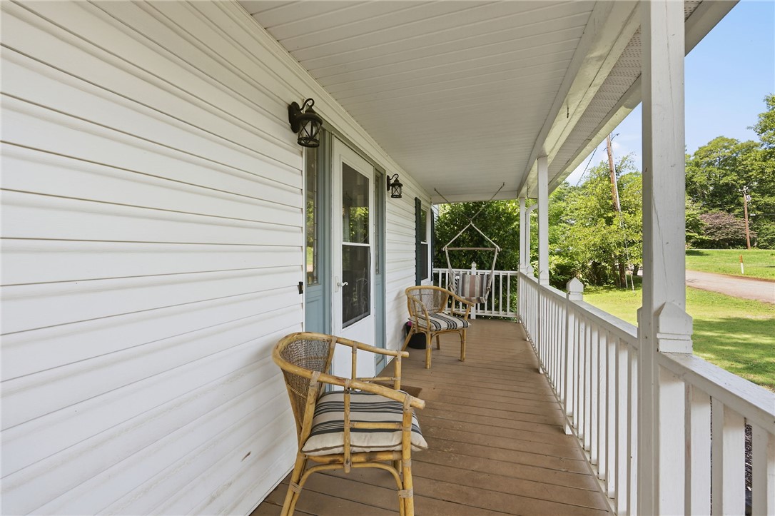 108 Tarrant Street Central, SC 29630 - Photo 5 of 42 A spacious covered porch offers a tranquil setting with ample outdoor living area.