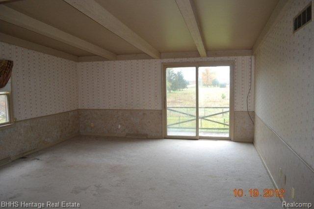 3241 North Burkhart Road Howell, MI 48855 - Photo 23 of 25 Master bedroom