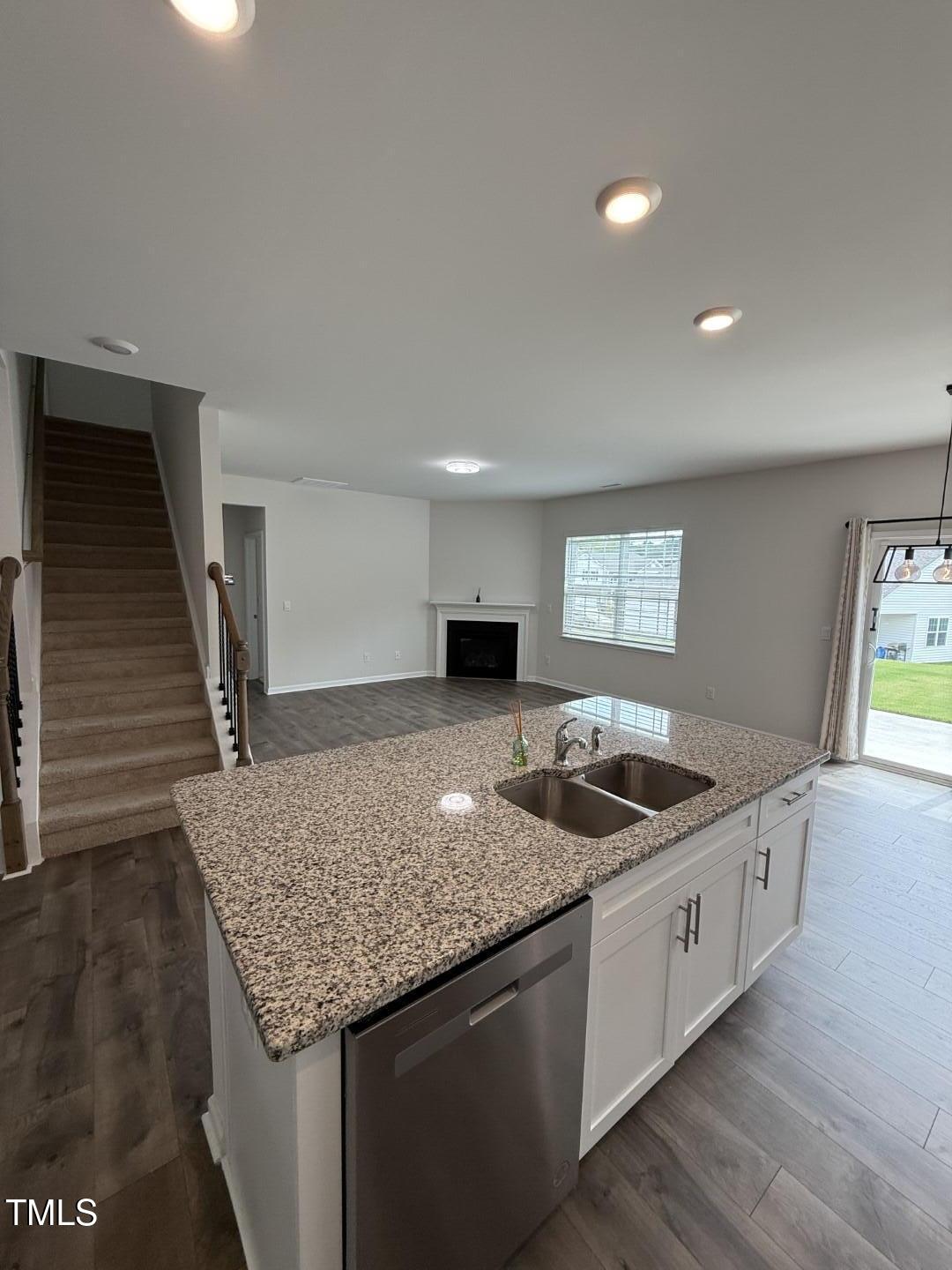 2018 Fletchers Ridge Drive Durham, NC 27703 - Photo 20 of 41 a kitchen that has a sink and a stove