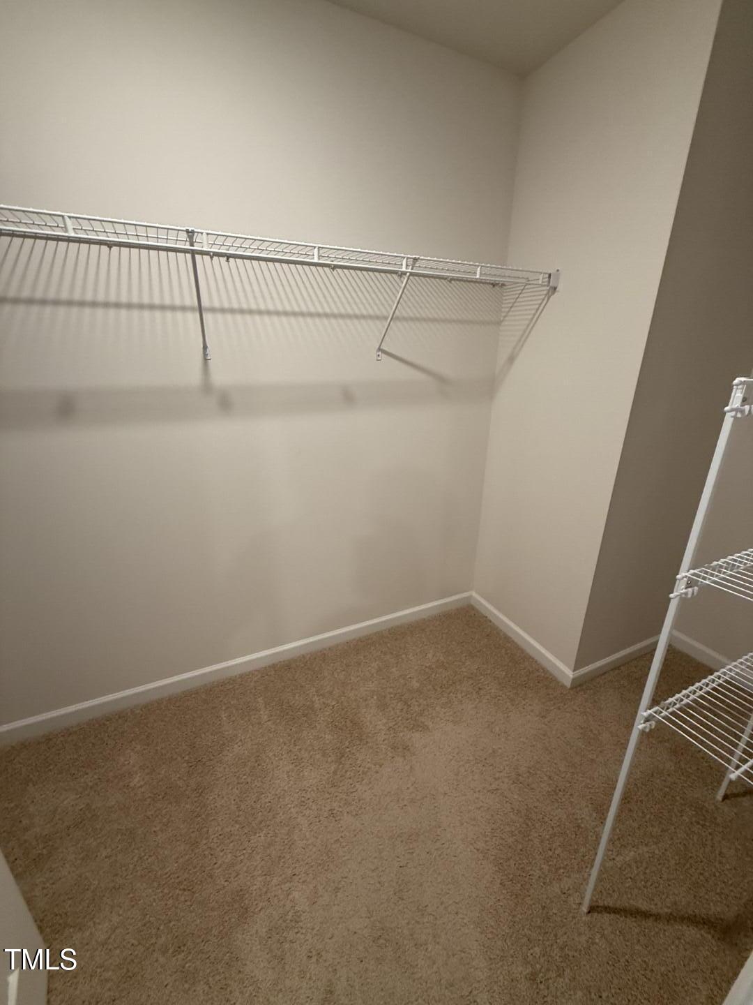 2018 Fletchers Ridge Drive Durham, NC 27703 - Photo 28 of 41 a view of a room with racks on the wall