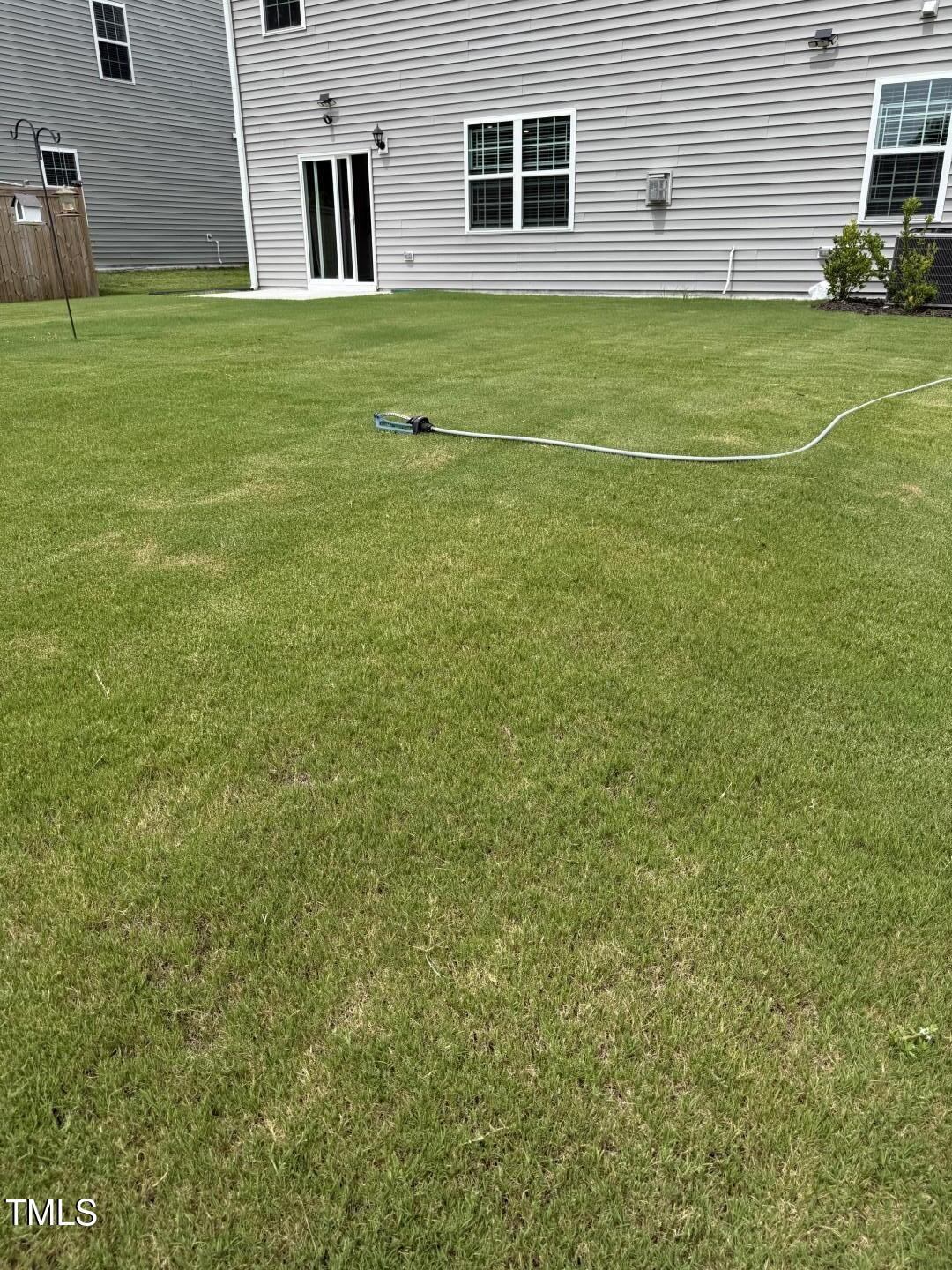 2018 Fletchers Ridge Drive Durham, NC 27703 - Photo 38 of 41 a view of a big room with a big yard and large trees